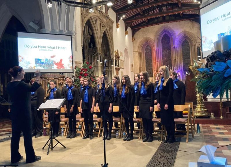 Youth choir singing carols in church