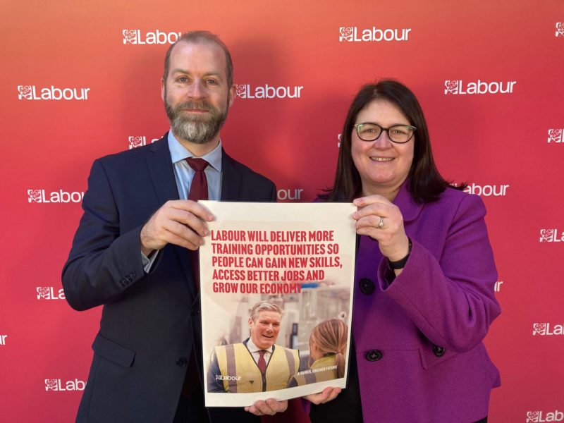 Rachel Hopkins MP and Jonathan Reynolds MP holding poster saying 