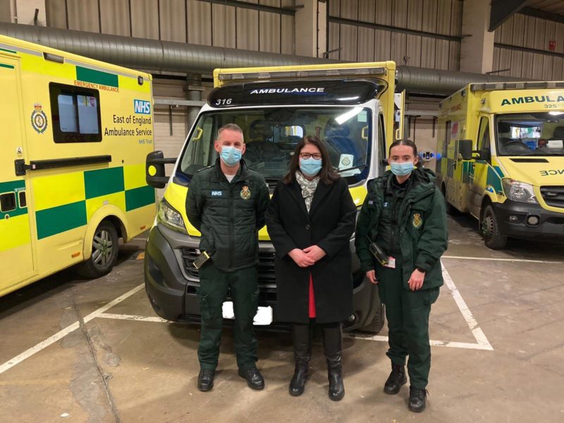 Rachel Hopkins MP with paramedics in front of ambulance