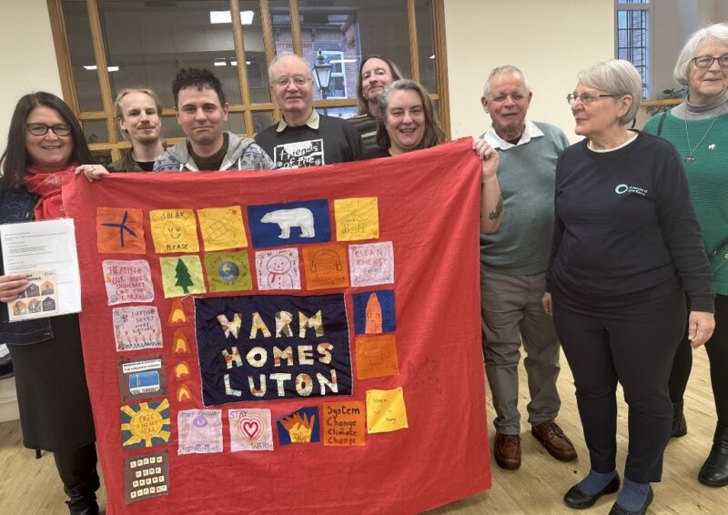 Rachel with Luton Friends of the Earth and their quilt