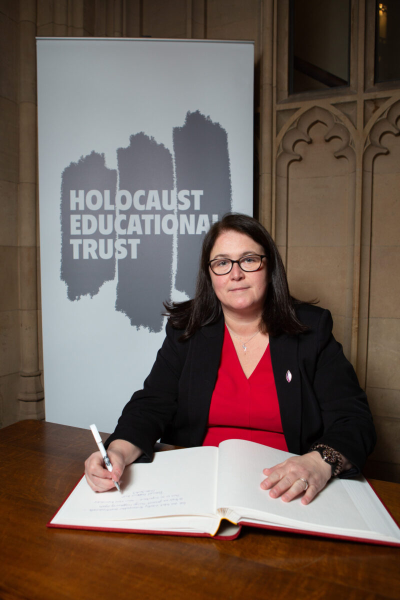 Rachel signing the Holocaust Education Trust