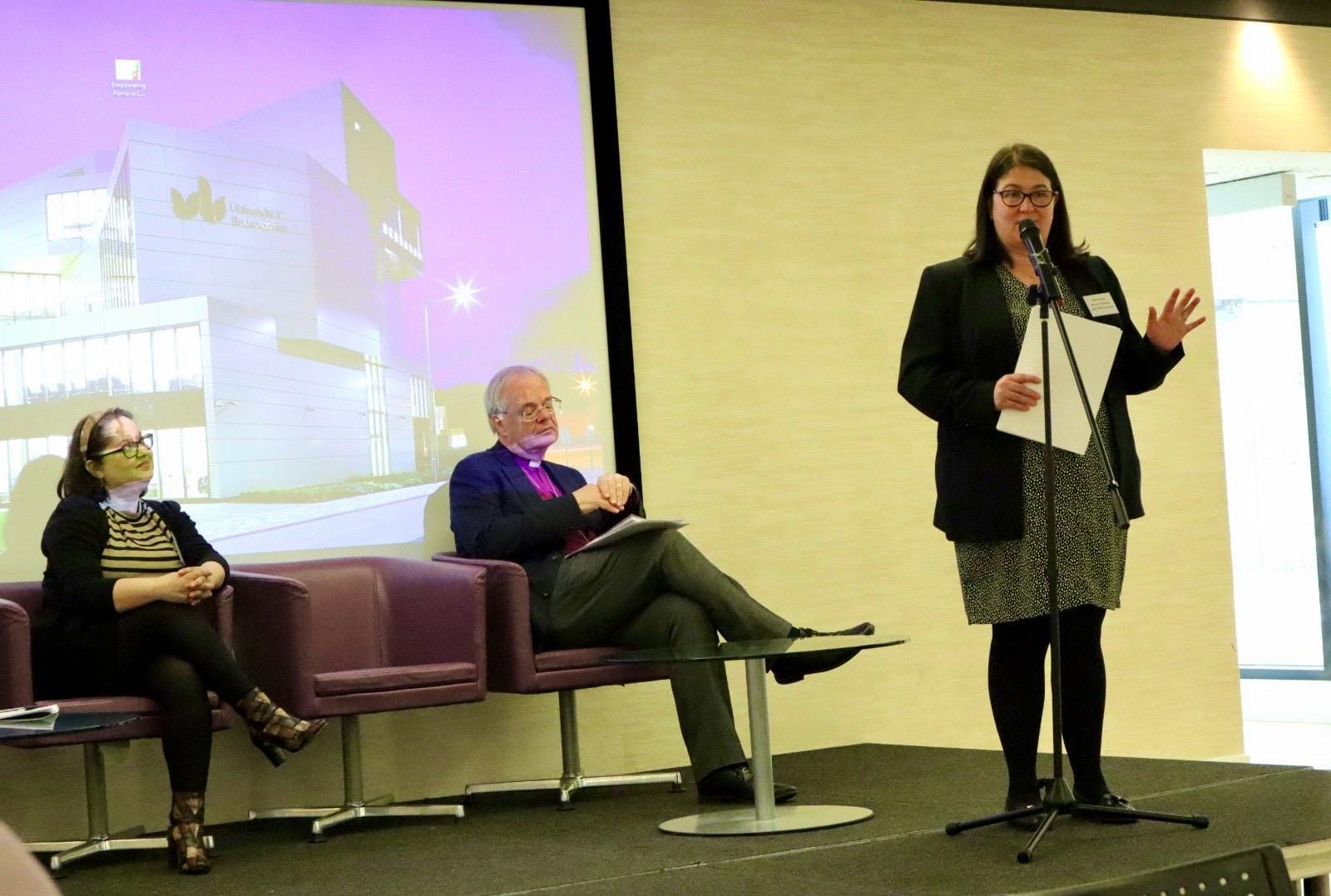 Rachel speaking at the event, alongside the Bishop of Bedford and Crina Morteanu, manager of Luton Roma Trust